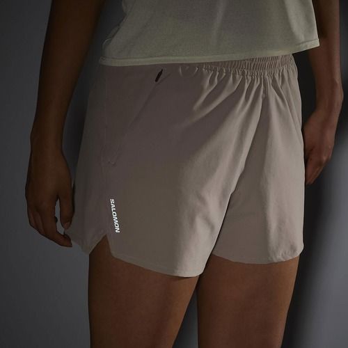 Laufshorts Damen Salomon SHAKEout Core 4" etherea