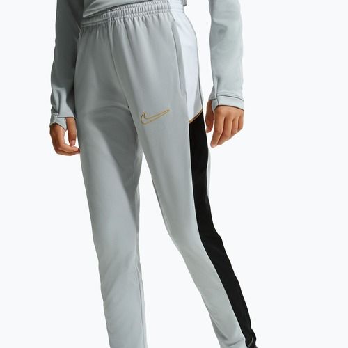 Kinder-Trainingshose Nike Academy Dri-Fit Jr light smoke grey/white/black/metallic gold