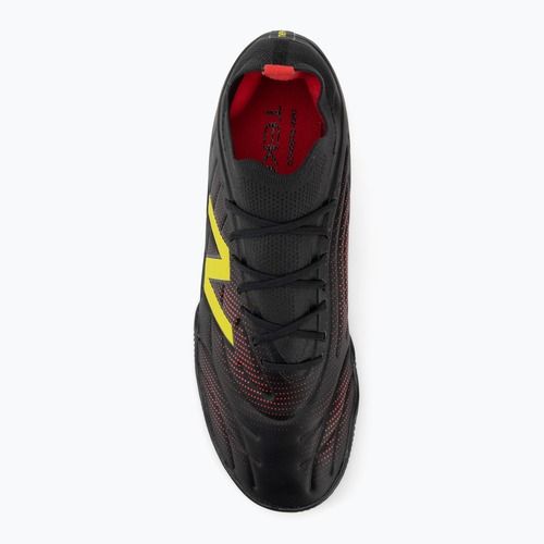 Fußballschuhe New Balance Schuhe Tekela Team Low V5 IN black 100/punch yellow/fire cracker