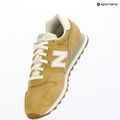 Damenschuhe New Balance 373's V2 quicksand/mosaic green 10