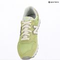 Damenschuhe New Balance 373's V2 dry lime/dark silver metallic 9