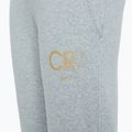 Nike CR7 Club Fleece Kinderhose leicht rauchgrau / heather / metallic gold 4