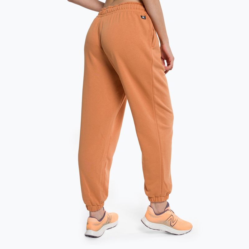 Damen Trainingshose New Balance Essentials Reimagined Archive braun NBWP31508