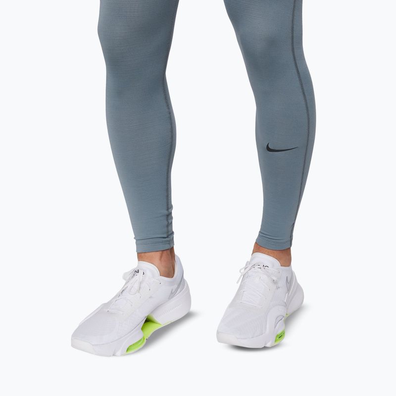 Herren-Leggings Nike Pro Warm smoke grey/black 6