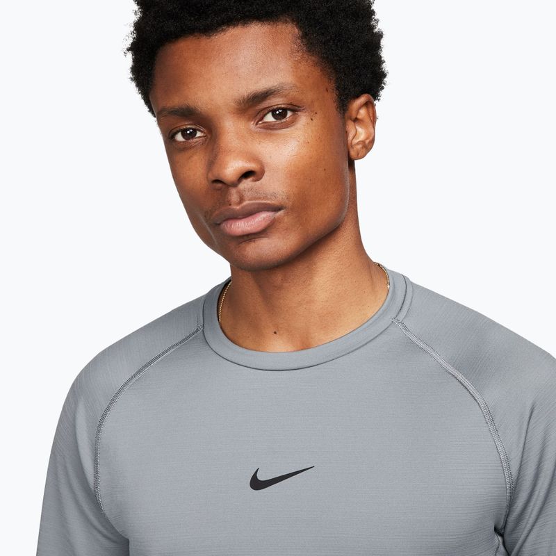 Herren-Trainingslangarmshirt Nike Pro Warm smoke grey/black 4