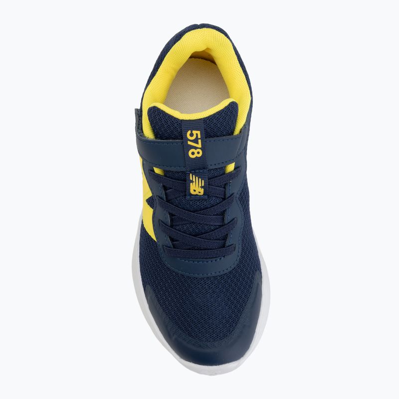 Kinderschuhe New Balance 578's V1 team navy/punch yellow 5