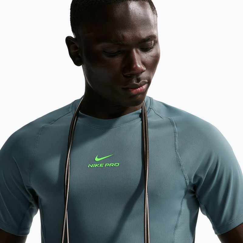 Trainings-T-Shirt Herren Nike Pro Training Dri-Fit mineral slate/green strike 6