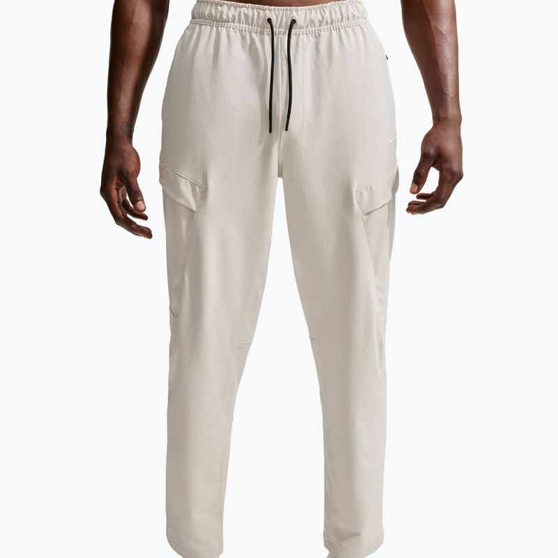 Herrenhose Nike Unlimited ight orewood brown/black/light orewood brown