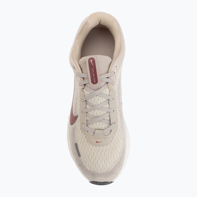 Nike Stellar Ride Laufschuhe cream ii/coconut milk/pink smoke 5