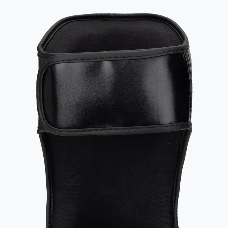 Schienbein- und Fußschützer Venum Ringhorns Charger Shin black/gold 7