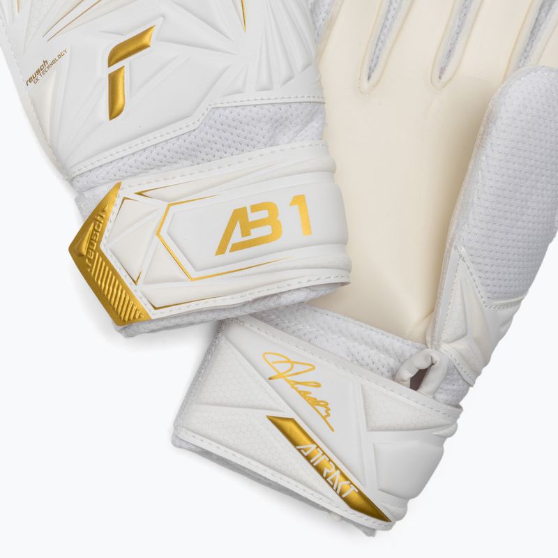 Kinder-Torwarthandschuhe Reusch Attrakt AB1 Solid Junior white/gold 5