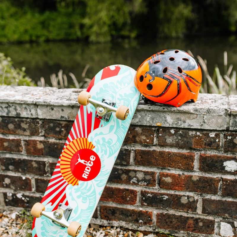 Hornit Spider orange/schwarzer Kinderfahrradhelm