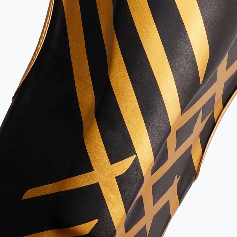 Schienbein- und Fußschutz StormCloud Lynx black/gold 6