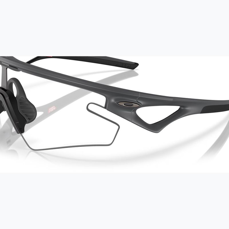 Sonnenbrille Oakley Sphaera Slash carbon/clear to black iridium photochromic 6